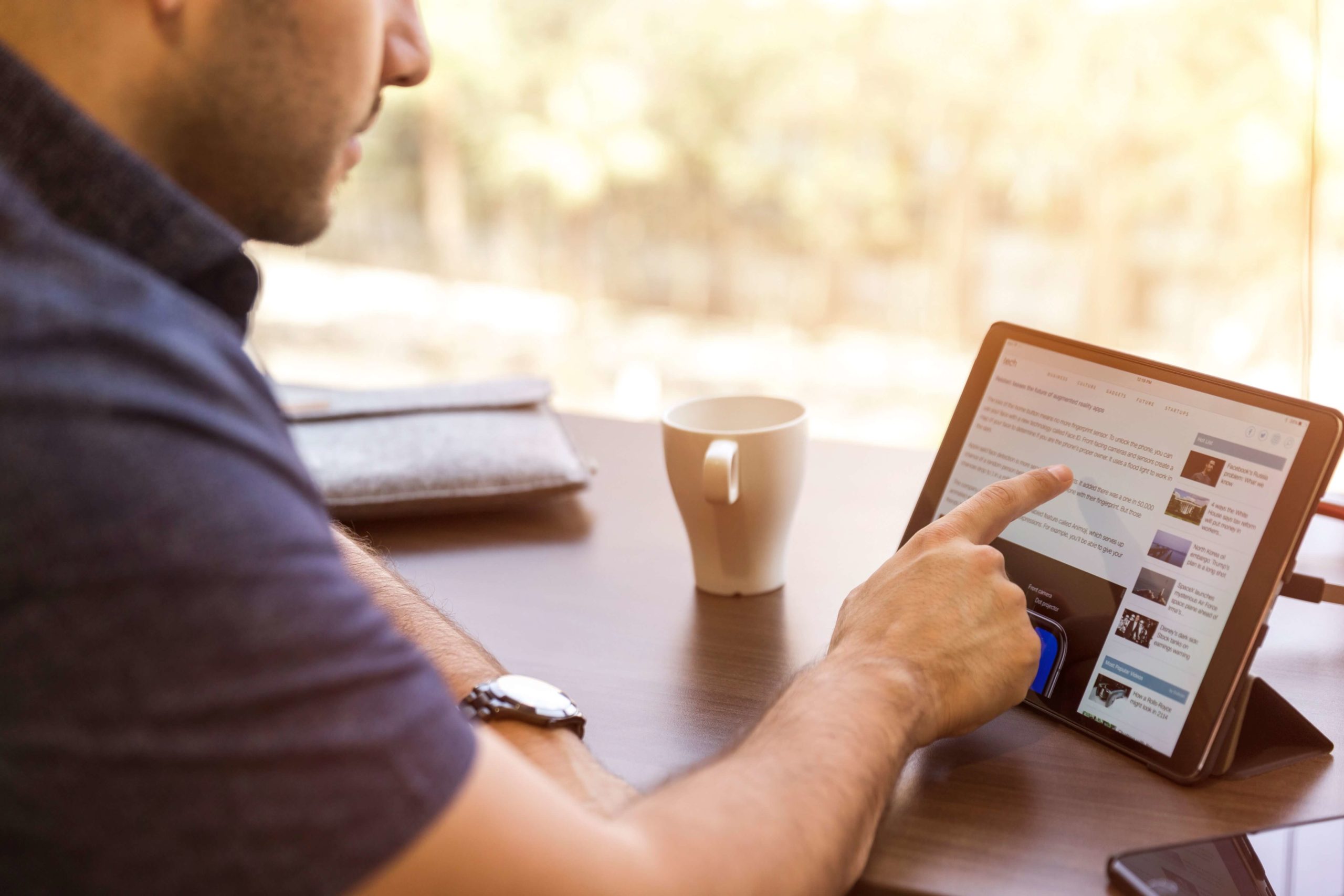 LinkedIn Sales Groups. Person browsing through LinkedIn