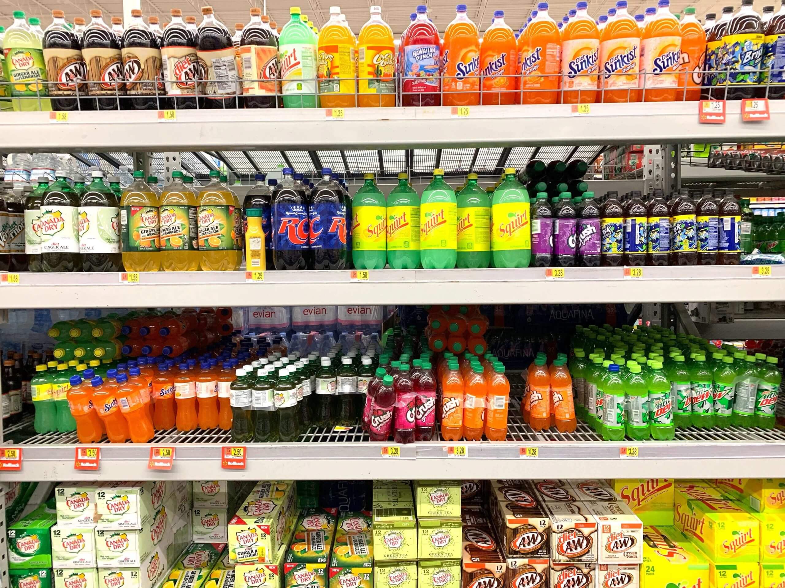 Shelves with soda drinks in a supermarket